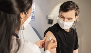 Person receiving vaccine