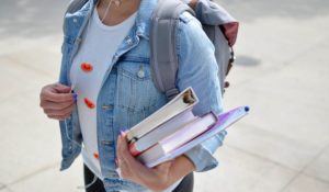 Student carrying books