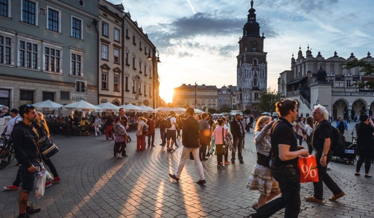 Tourists on Main Market Square in Krakow, Poland.